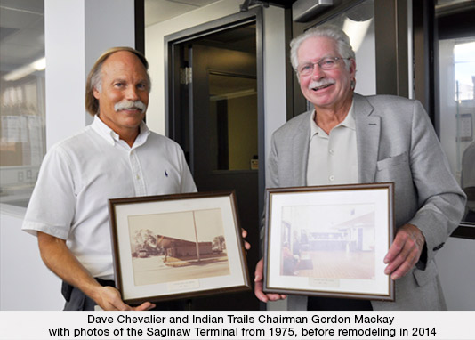 Dave Chevalier and Indian Trails Chairman Gordon Mackay with photos of the Saginaw Terminal from 1975, before remodeling in 2014